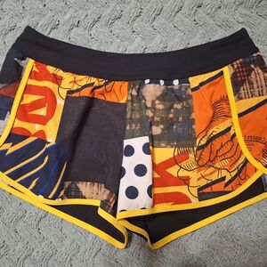 Reebok Multicolor Patchwork Women's Athletic Shorts with Yellow Trim
